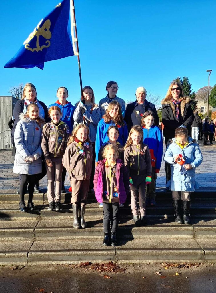 Brownies Poppy, Skye, Georgia, Caitlin, Kirsty, Melissa and Morven, Guides Heather Sweeney, Eilidh Ridshill, Cora Robertson, and Rangers Lauren Daly and Kirsty Balance with Guiders Claire Thomson, Aileen Baird and Alison Ringrose at the Remembrance Service in Helensburgh town centre