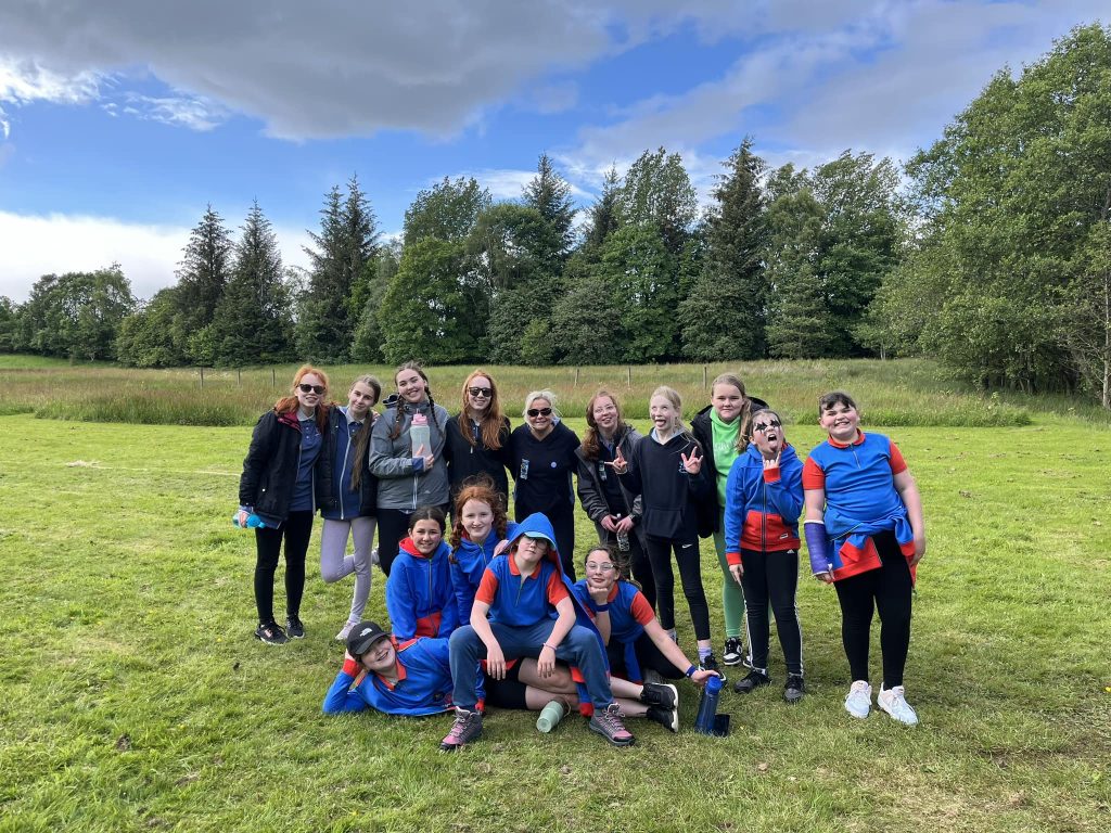 6th Clydebank Guides pose on a field for a picture